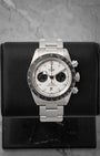frontal portrait of the 2021 Tudor Black Bay Chrono M79360N watch with a white opaline panda dial on a black leather display mount