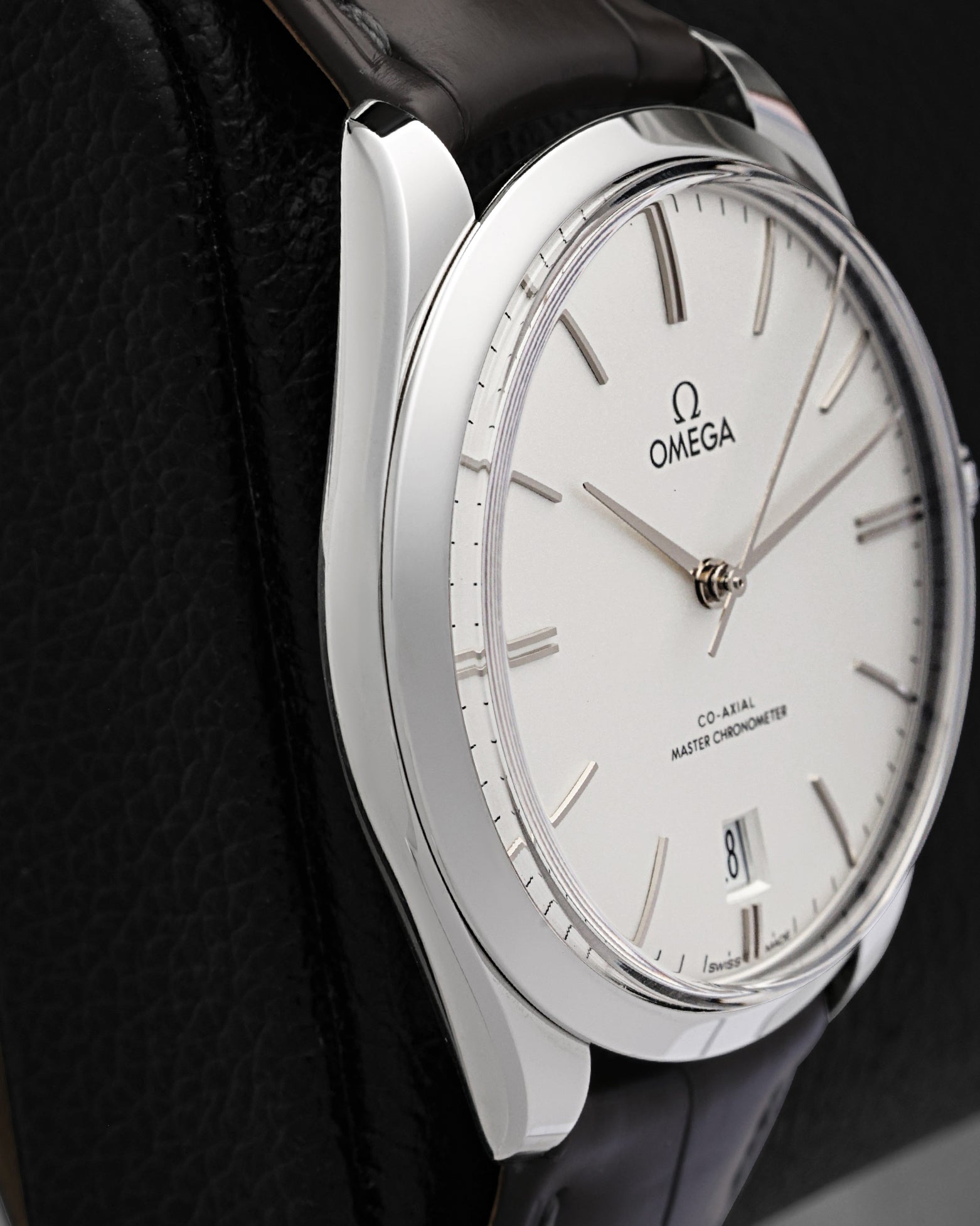 Side profile view showing the slim 40mm stainless steel case of an Omega De Ville Trésor