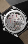 Transparent sapphire caseback revealing the manual-wind Omega Co-Axial Master Chronometer Calibre 8910 movement