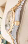 Side profile detail showing the 28mm stainless steel case, factory diamond bezel, and 18k yellow gold Twinlock winding crown on a Rolex Lady-Datejust 279383RBR