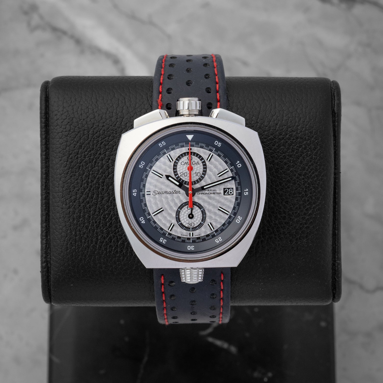 Omega Seamaster Bullhead watch with a silver dial, chronograph sub-dialsa and a black perforated leather strap