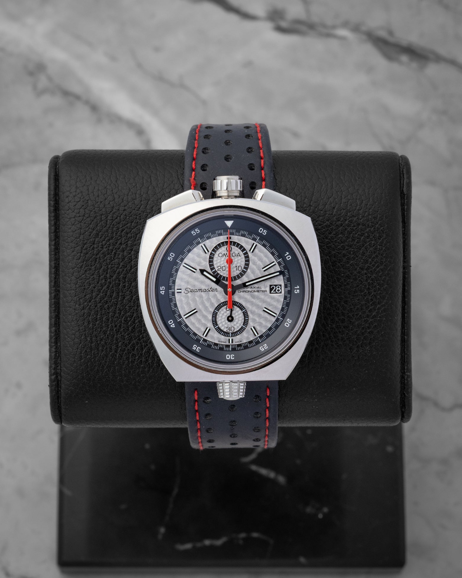 Omega Seamaster Bullhead watch with a silver dial, chronograph sub-dialsa and a black perforated leather strap