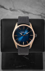 H. Moser & Cie. Pioneer Centre Seconds 3200-0903 sports watch with a Midnight Blue fumé dial and black rubber strap on a leather display mount