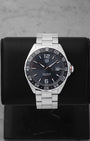 2023 TAG Heuer Formula 1 Automatic 43mm watch WAZ2011.BA0842 featuring an anthracite gray dial on a black display stand
