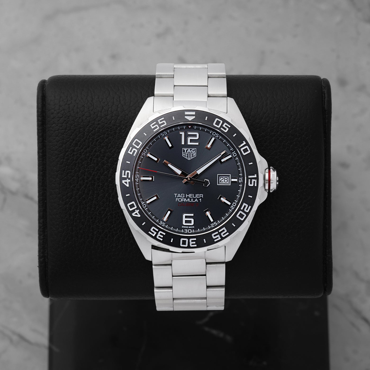 2023 TAG Heuer Formula 1 Automatic 43mm watch WAZ2011.BA0842 featuring an anthracite gray dial on a black display stand