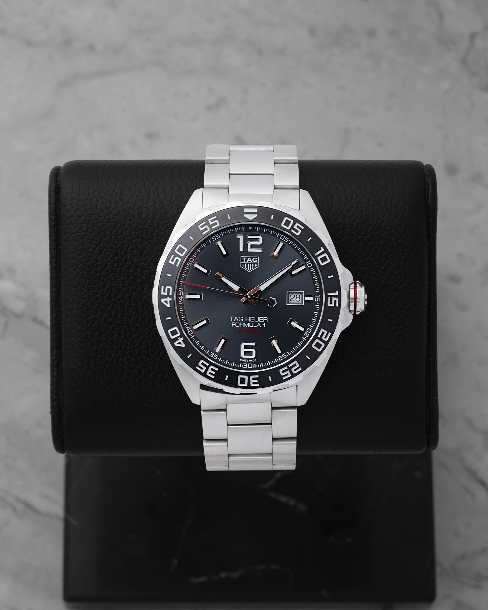 2023 TAG Heuer Formula 1 Automatic 43mm watch WAZ2011.BA0842 featuring an anthracite gray dial on a black display stand
