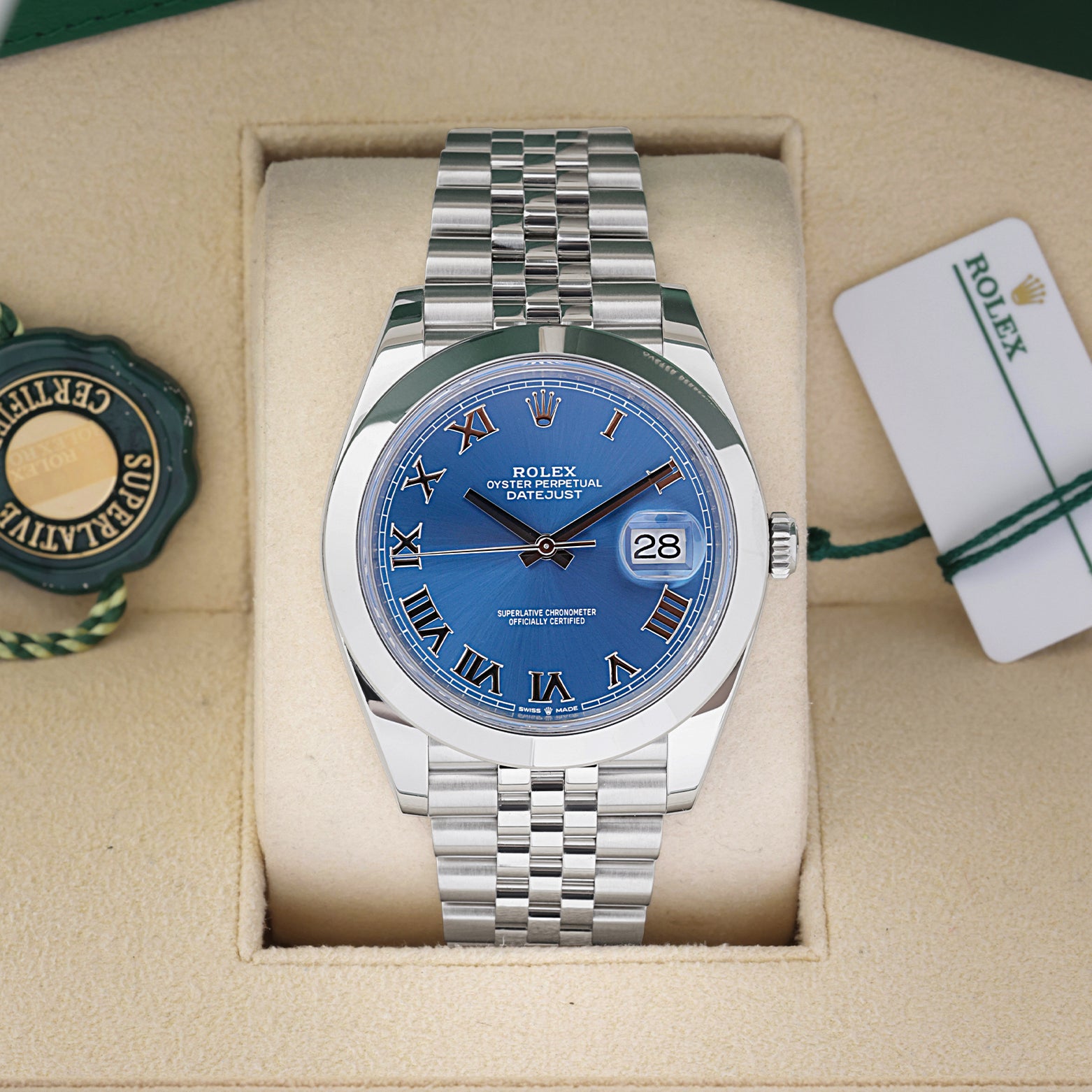 2024 Rolex Datejust 41 126300 with an Azzurro blue Roman numeral dial and smooth bezel inside its box with hang tags