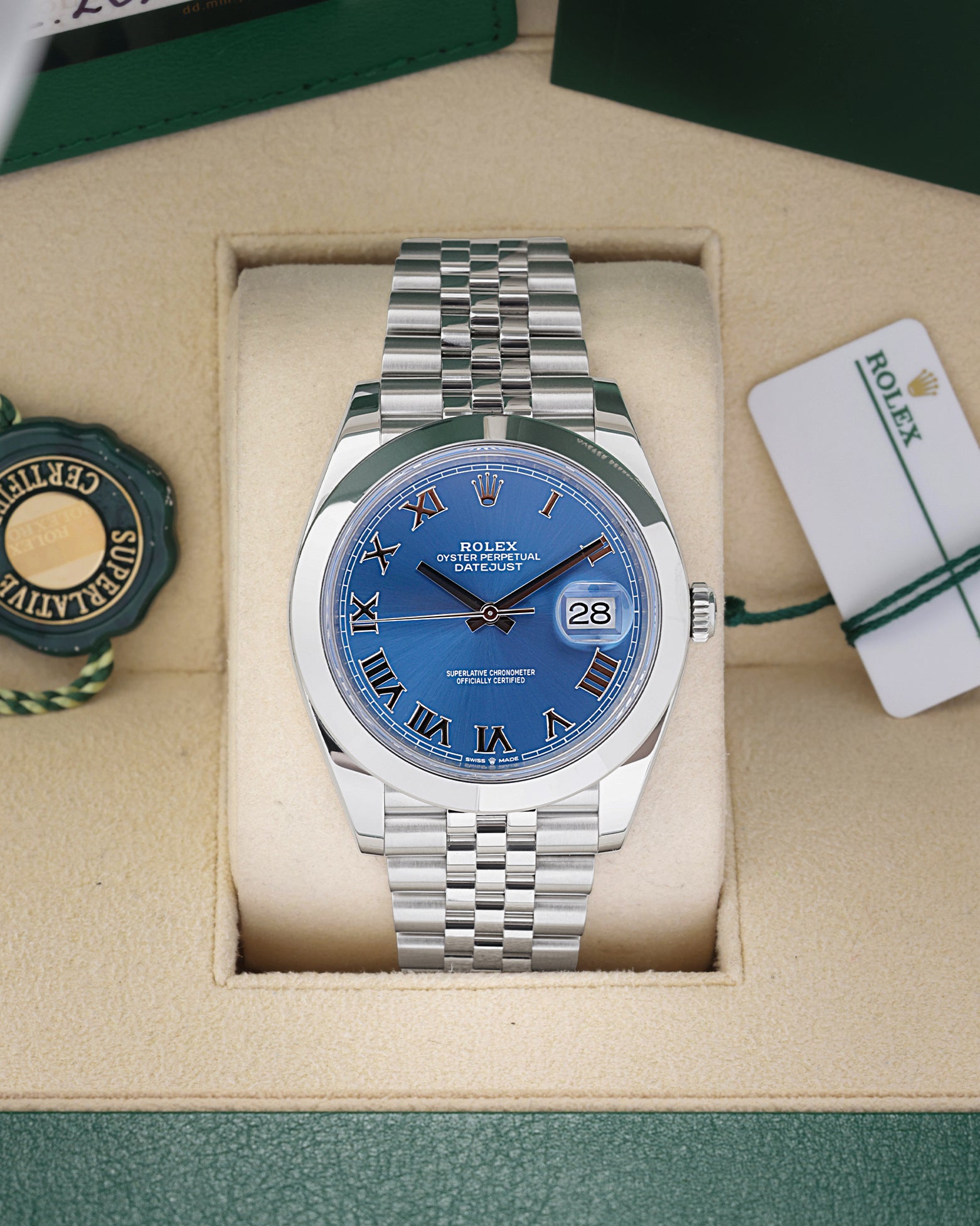 2024 Rolex Datejust 41 126300 with an Azzurro blue Roman numeral dial and smooth bezel inside its box with hang tags