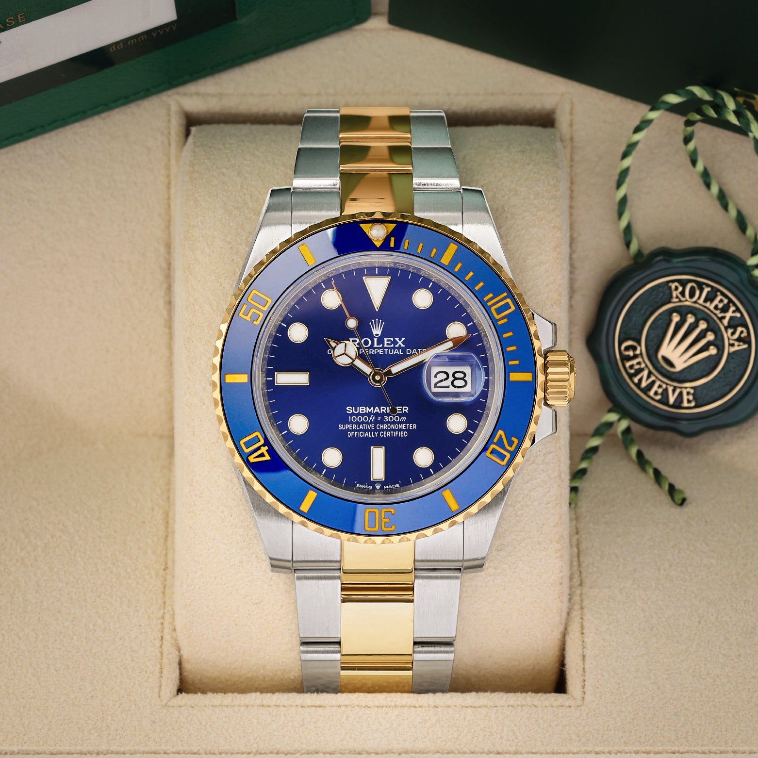 2024 Rolex Submariner Date "Bluesy" 41mm watch in two-tone yellow gold and steel, model 126613LB, on display at Noah's Fine Watches & Jewelry in Dallas