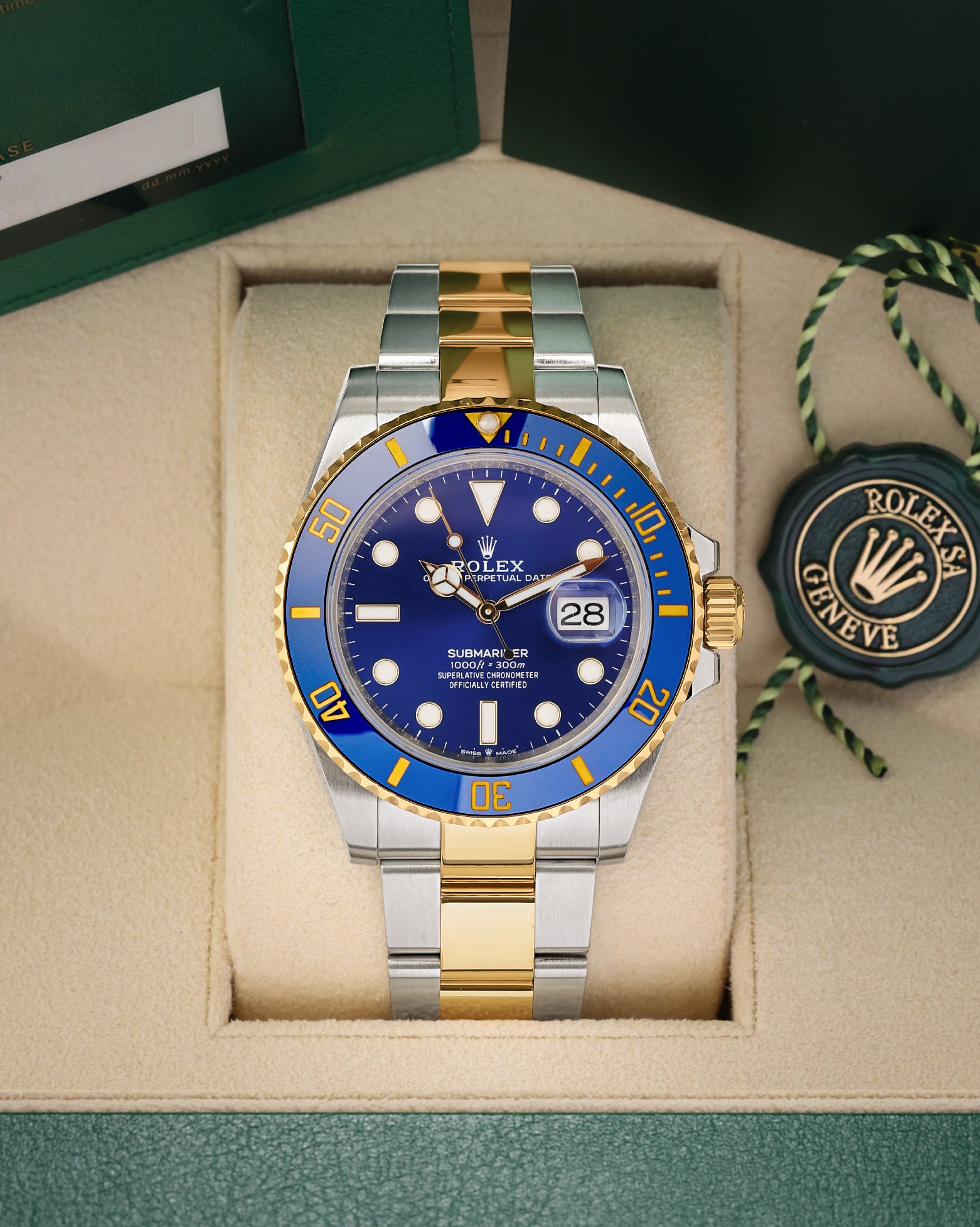 2024 Rolex Submariner Date "Bluesy" 41mm watch in two-tone yellow gold and steel, model 126613LB, on display at Noah's Fine Watches & Jewelry in Dallas