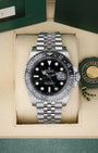 Preowned 2025 Rolex GMT-Master II 126710GRNR Oystersteel watch with grey and black ceramic bezel and green GMT hand on a Jubilee bracelet at Noah's Fine Watches and Jewelry Dallas Texas