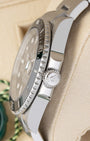 Side profile detail showing the 41mm stainless steel case, crown guards, and signed Triplock crown on a 2025 Rolex Submariner Date 126610LN