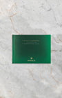 Green Rolex Submariner user manual instruction booklet accompanying the 2025 reference 126610LN