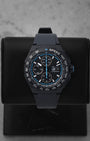 2025 TAG Heuer Formula 1 Automatic Chronograph CBZ2084.FT8097 with a black dial and blue racing accents on a black display stand
