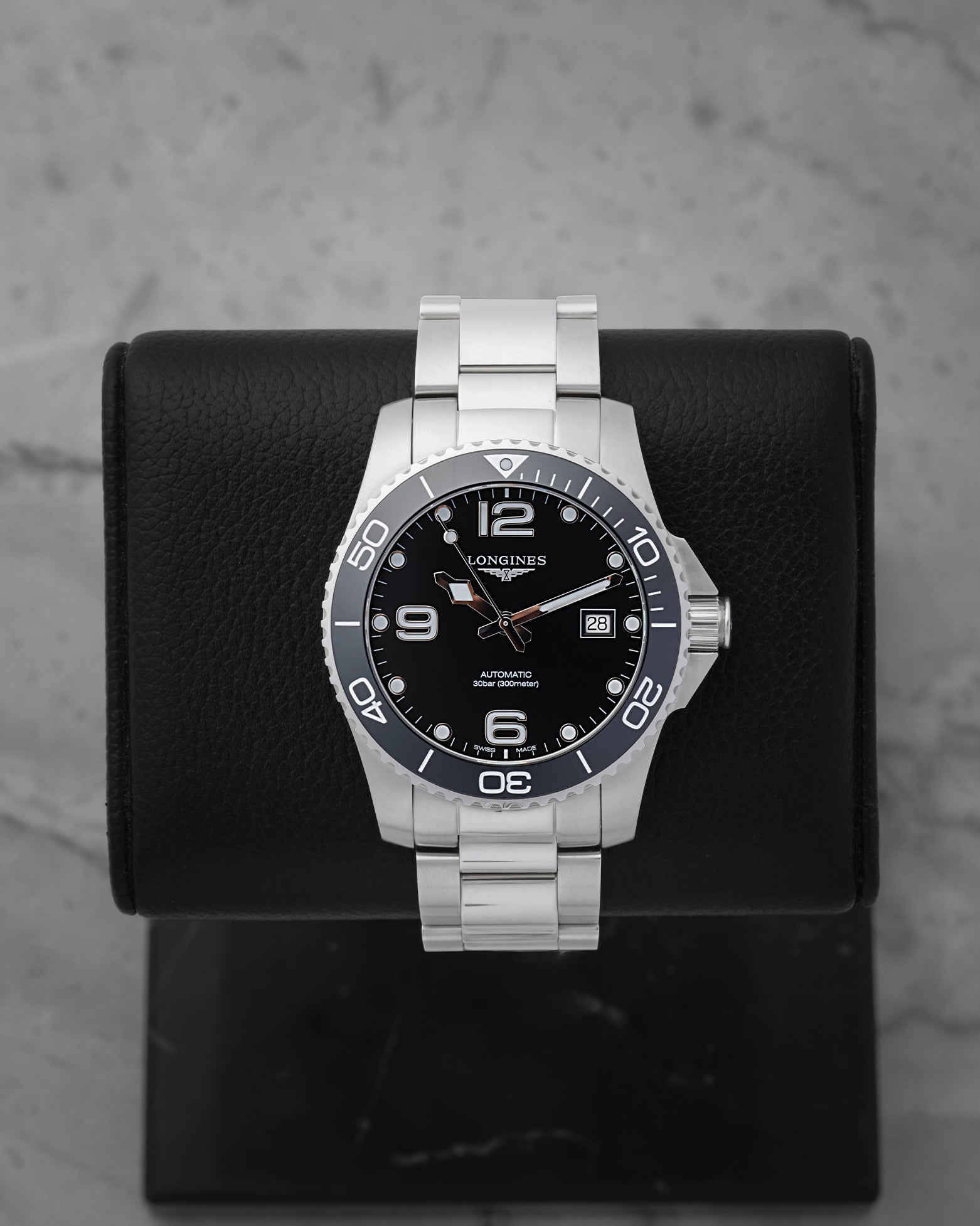 2026 Longines HydroConquest Automatic 41mm watch L3.781.4.56.6 with a black dial and ceramic bezel on a black display stand