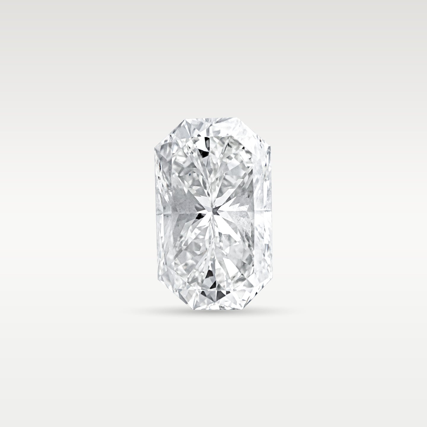 Face-up view of a 3.17 carat radiant cut loose diamond with Cut-Cornered Rectangular Modified Brilliant faceting