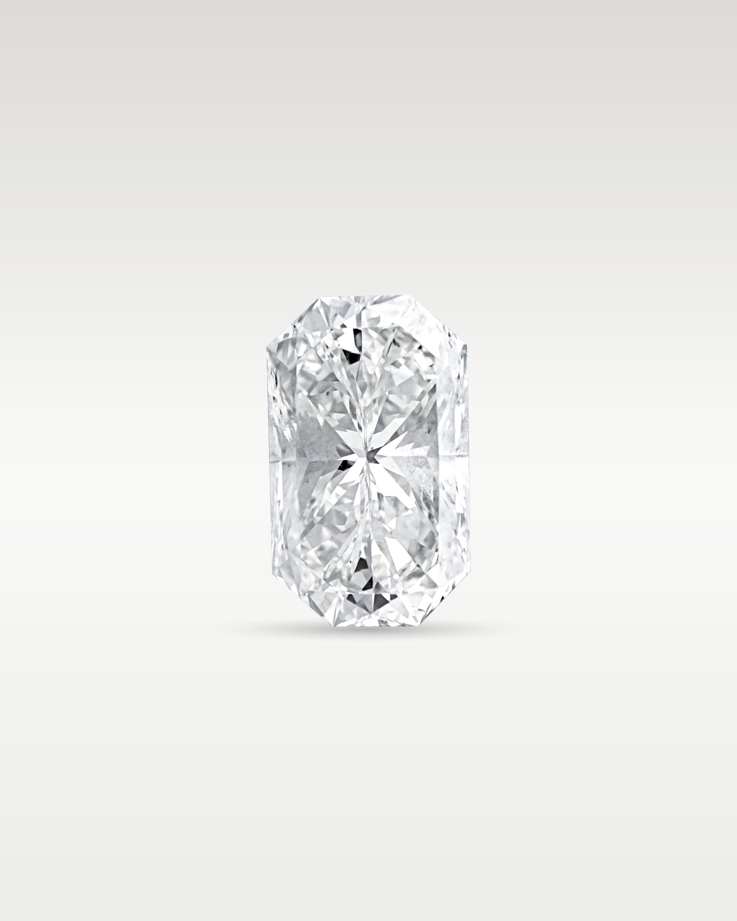 Face-up view of a 3.17 carat radiant cut loose diamond with Cut-Cornered Rectangular Modified Brilliant faceting