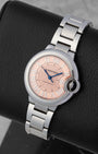 Cartier Ballon Bleu de Cartier watch with a pink guilloche dial Roman numerals and a stainless steel bracelet