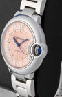 Cartier Ballon Bleu de Cartier watch with a pink guilloche dial Roman numerals and a stainless steel bracelet