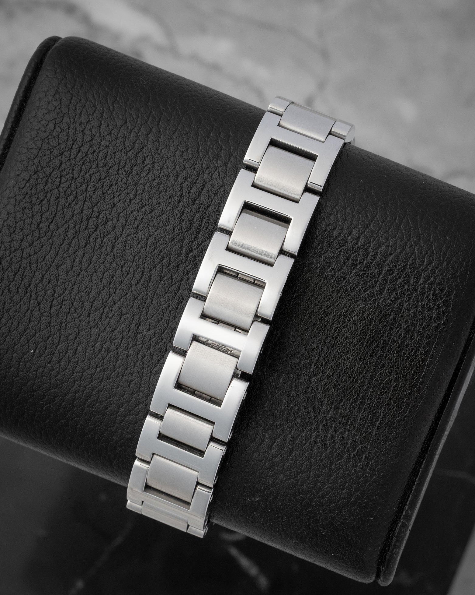 Cartier Ballon Bleu de Cartier watch with a pink guilloche dial Roman numerals and a stainless steel bracelet
