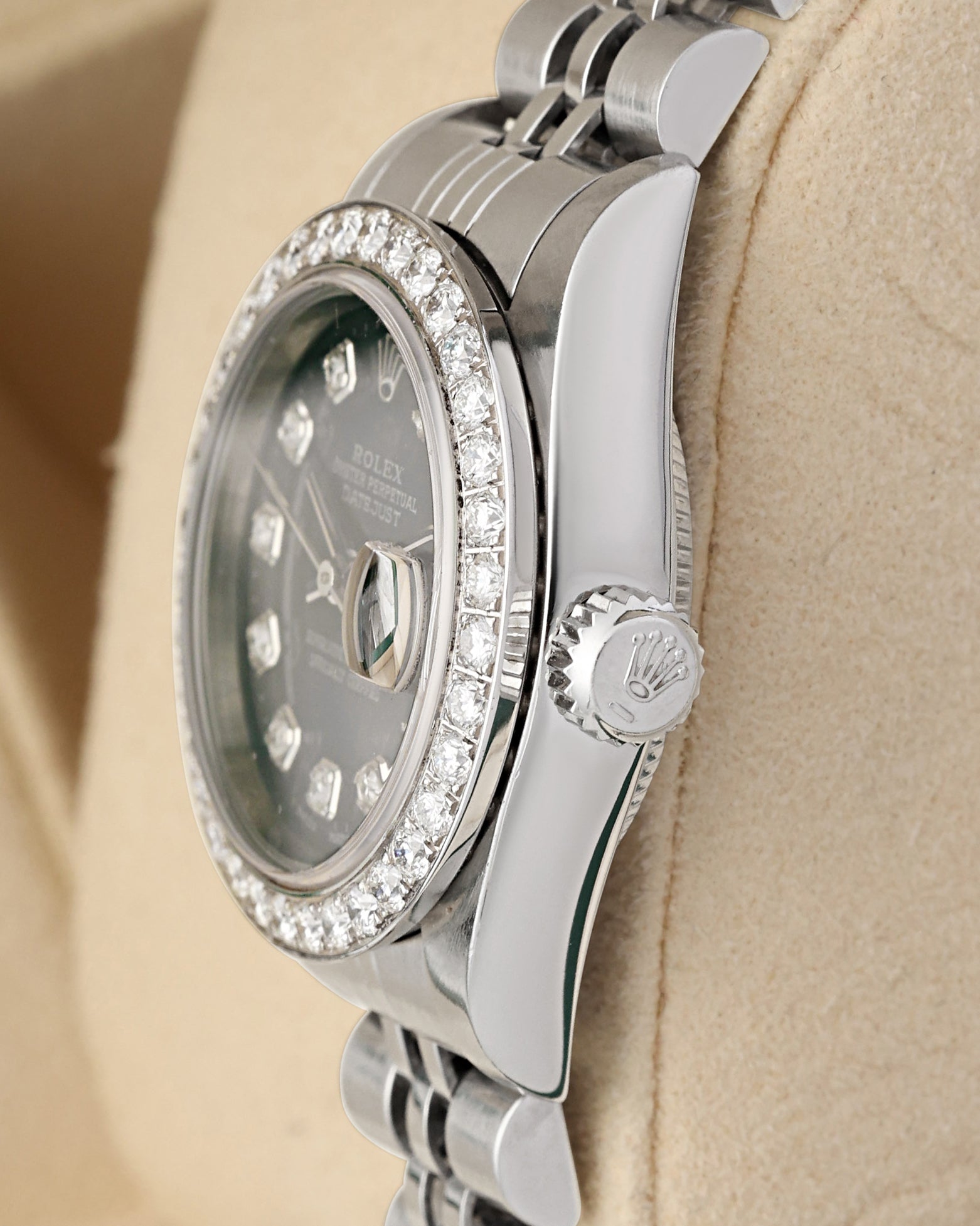 Close-up right profile view of the small ladies' watch head highlighting the custom diamond bezel edge, scratch-resistant sapphire crystal, and fluted steel Twinlock winding crown