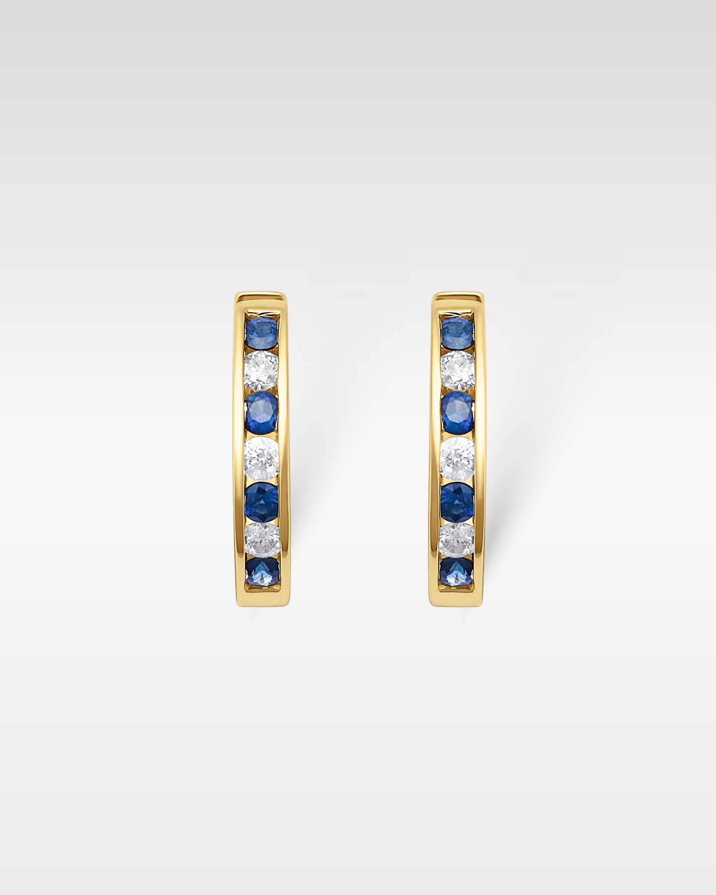 14k Gold Channel-Set Sapphire Diamond Huggies | Noah's Fine Jewelry & Watches