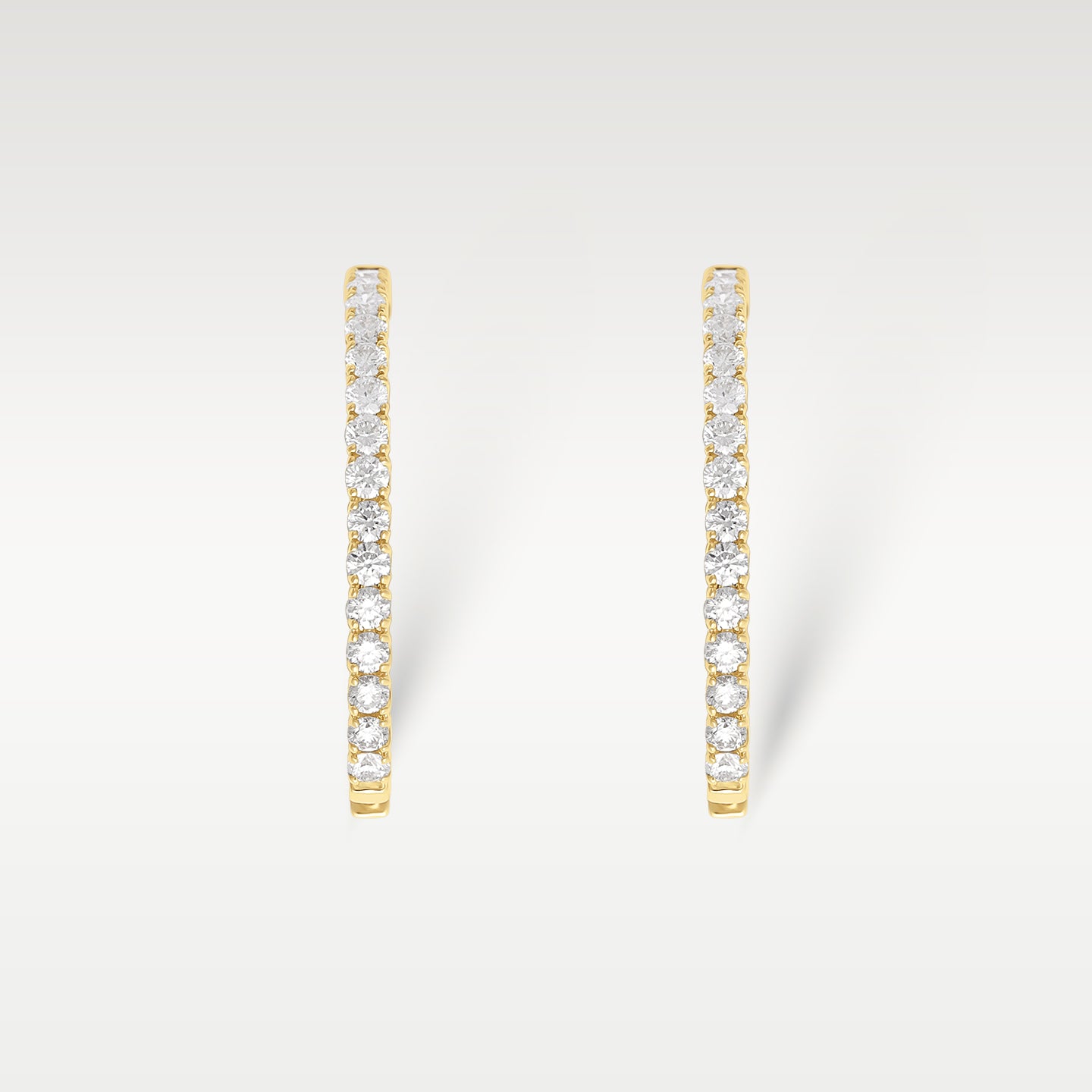 18k Gold Inside Out Emerald Cut Diamond Hoop Earrings | Noah's Fine Watches & Jewelry TX