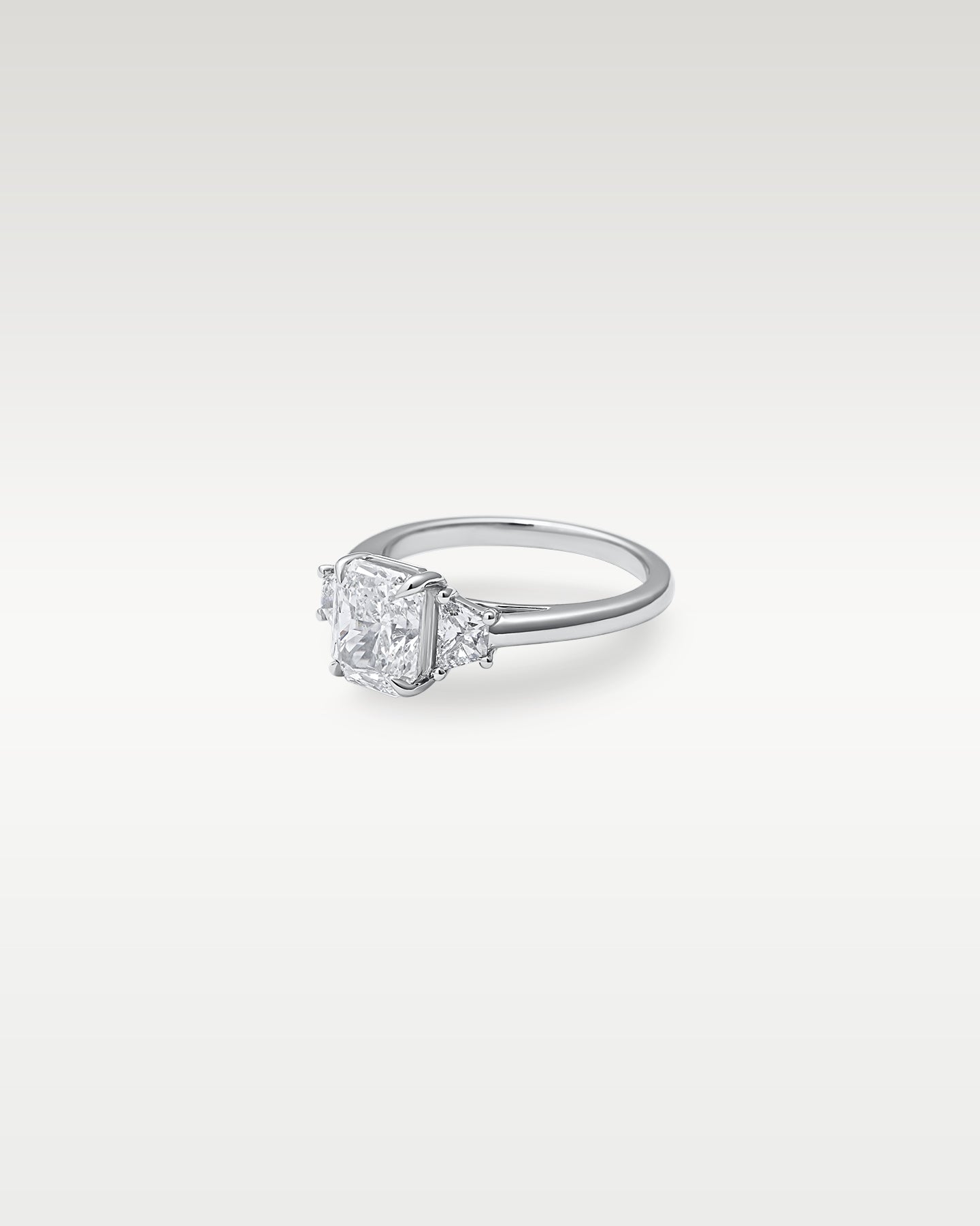 Platinum Radiant cut Diamond Three Stone Ring | Noah's Fine Jewelry Texas