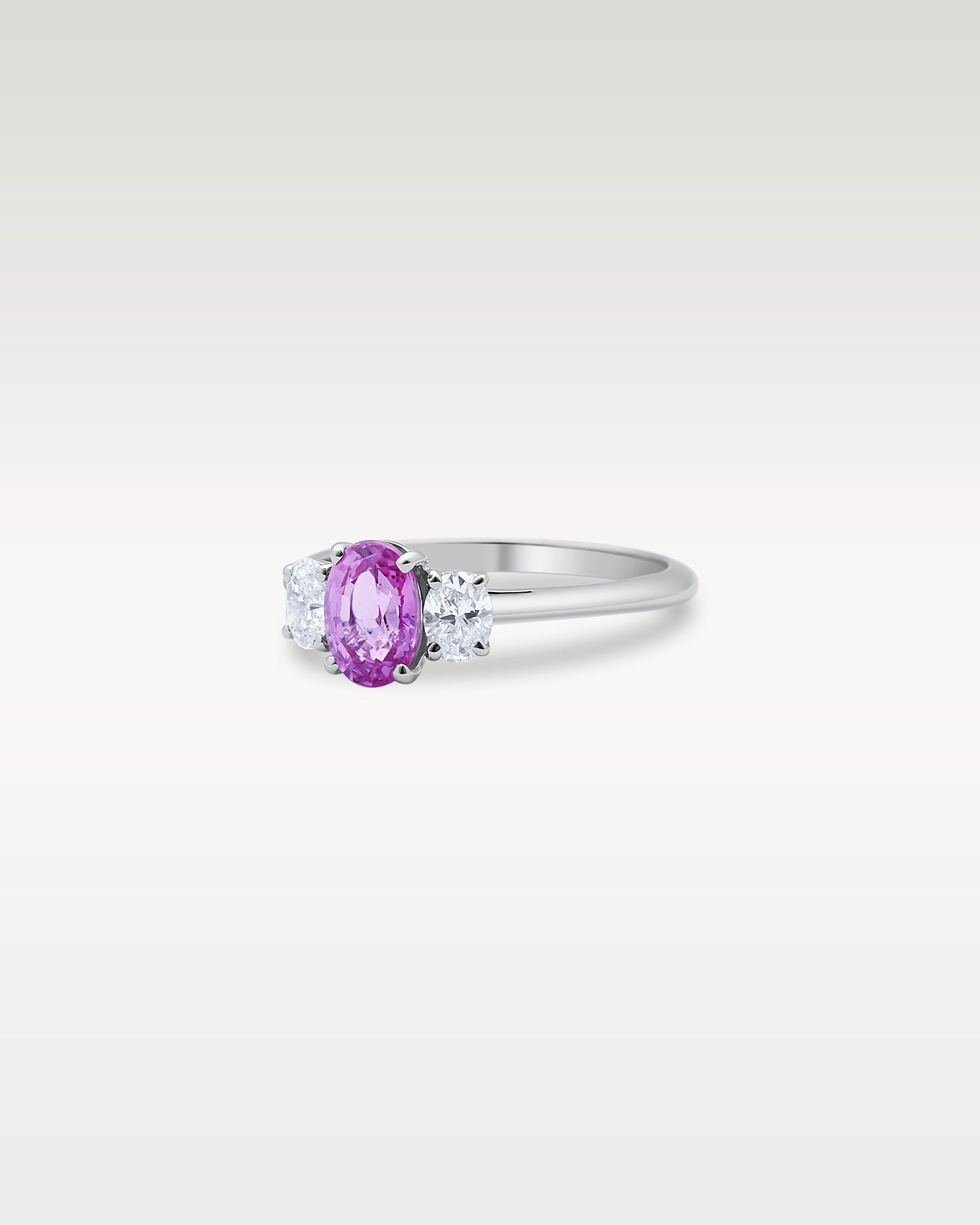 Platinum Three-Stone Pink Sapphire & Diamond Ring | Noah's Fine Jewelry Dallas, Texas