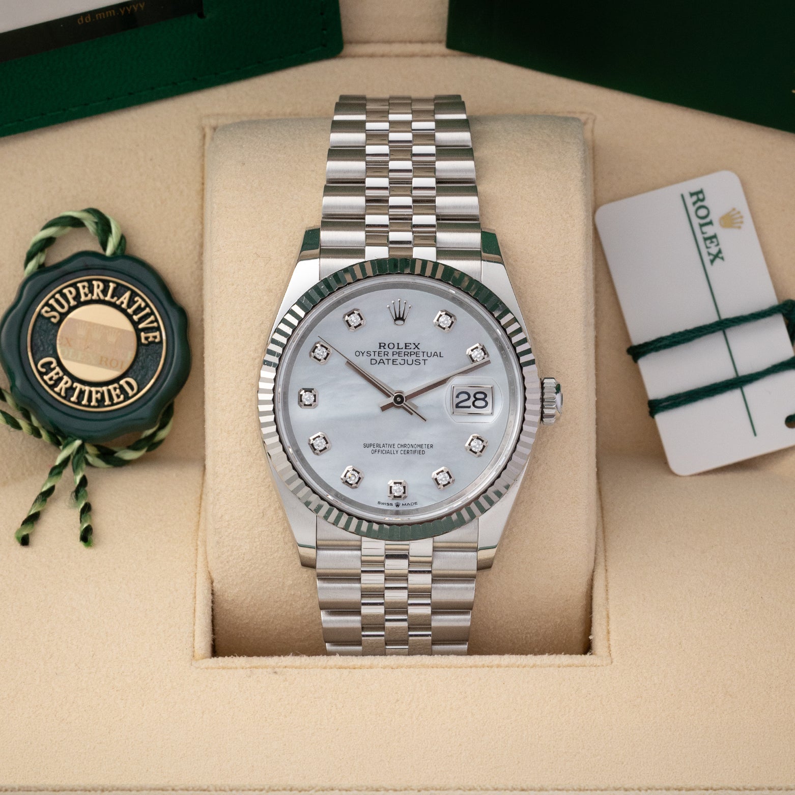 Pre owned 2024 Rolex Datejust 36 126234 white mother of pearl diamond dial with fluted bezel on Jubilee bracelet at Noah's Fine Watches Dallas