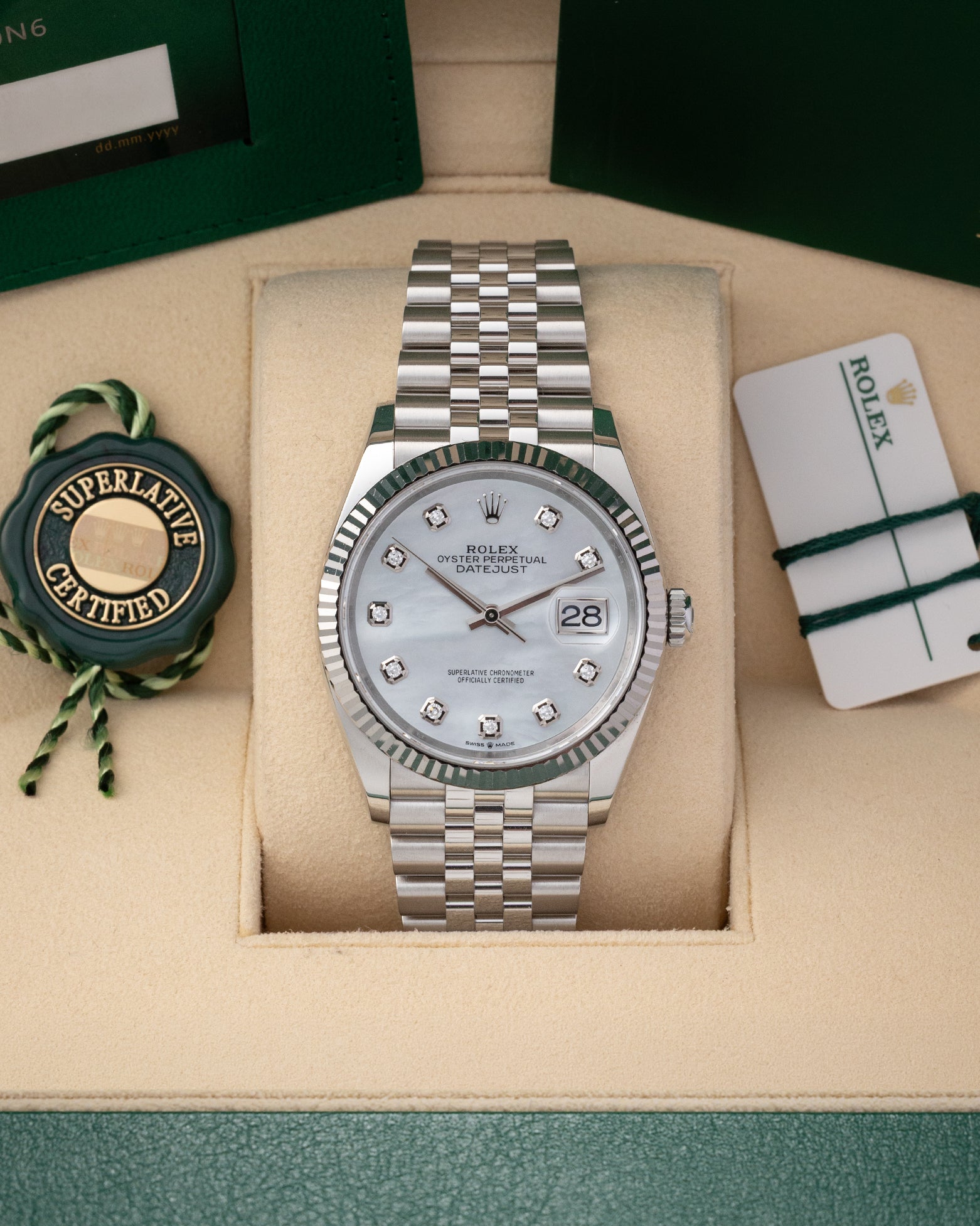 Pre owned 2024 Rolex Datejust 36 126234 white mother of pearl diamond dial with fluted bezel on Jubilee bracelet at Noah's Fine Watches Dallas