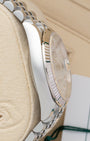 Polished Oystersteel case side profile and 18k white gold fluted bezel view of pre-owned Rolex Datejust 36 reference 126234