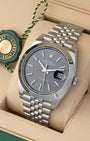 Angled view of Rolex Datejust 41 126300 displaying slate sunray dial, smooth bezel, and stainless steel Jubilee bracelet