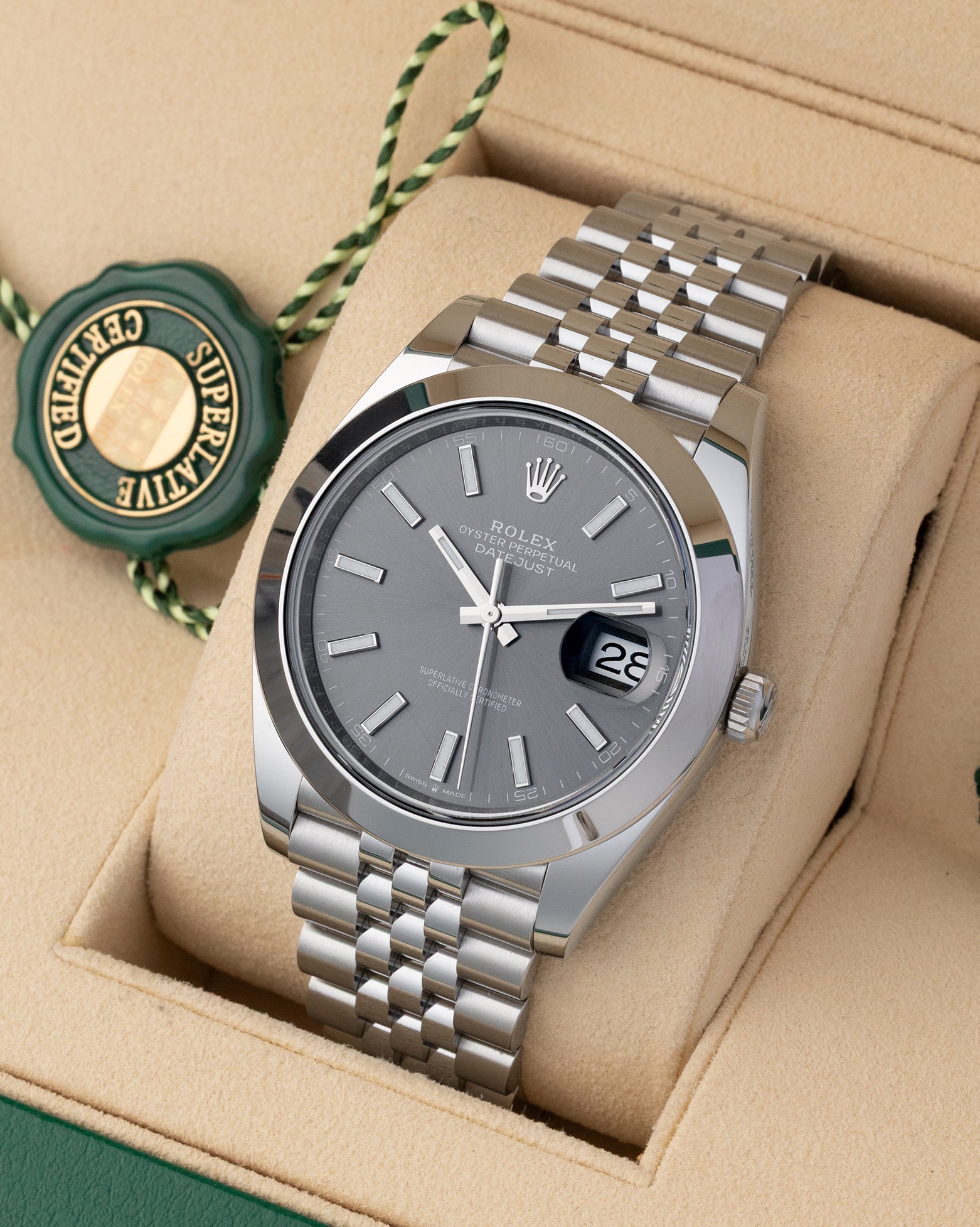 Angled view of Rolex Datejust 41 126300 displaying slate sunray dial, smooth bezel, and stainless steel Jubilee bracelet