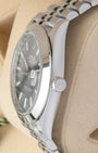 Side profile view of Rolex Datejust 41 126300 showing Twinlock screw-down winding crown and smooth bezel