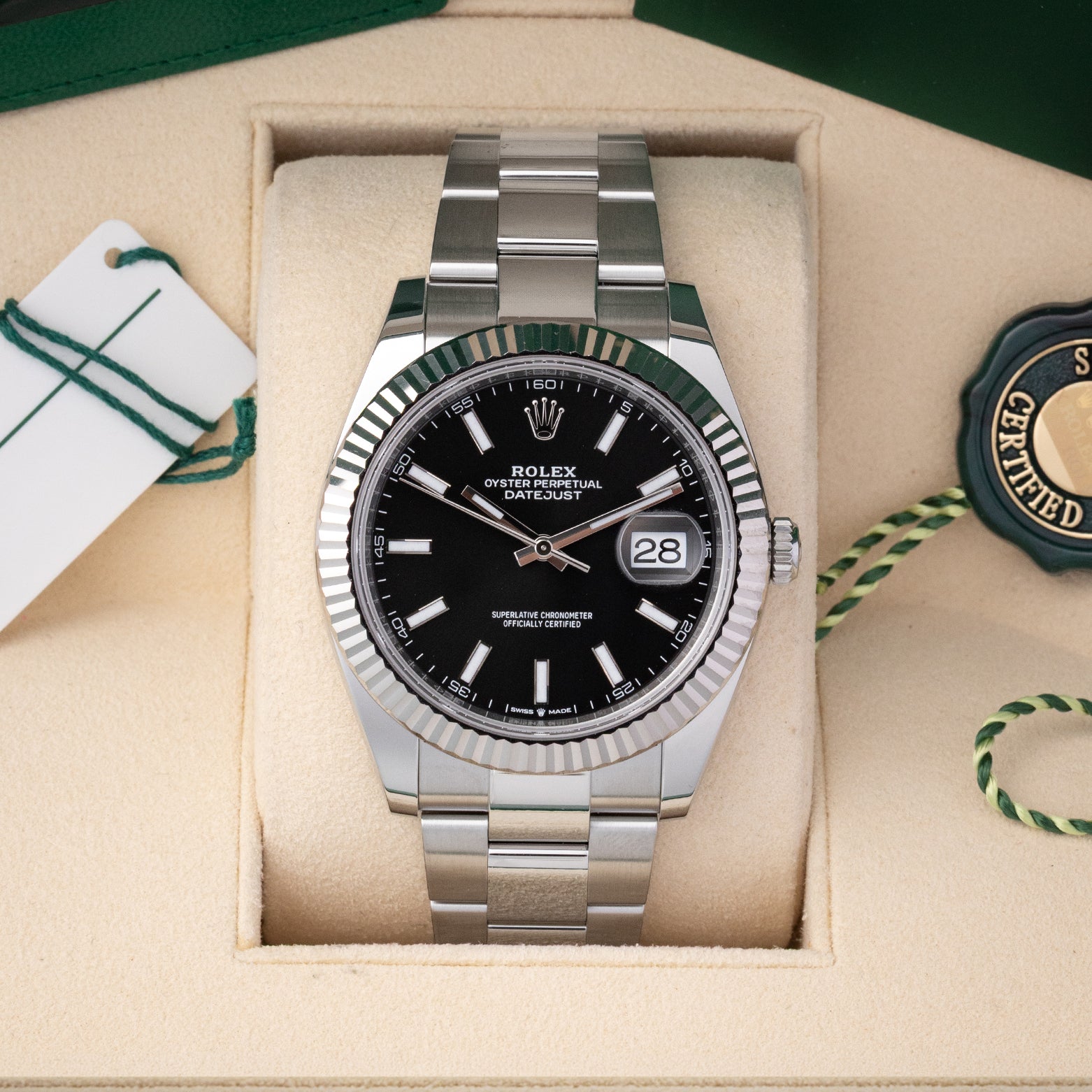 Pre owned 2024 Rolex Datejust 41 126334 black dial with fluted white gold bezel and Oyster bracelet at Noah's Fine Watches Dallas