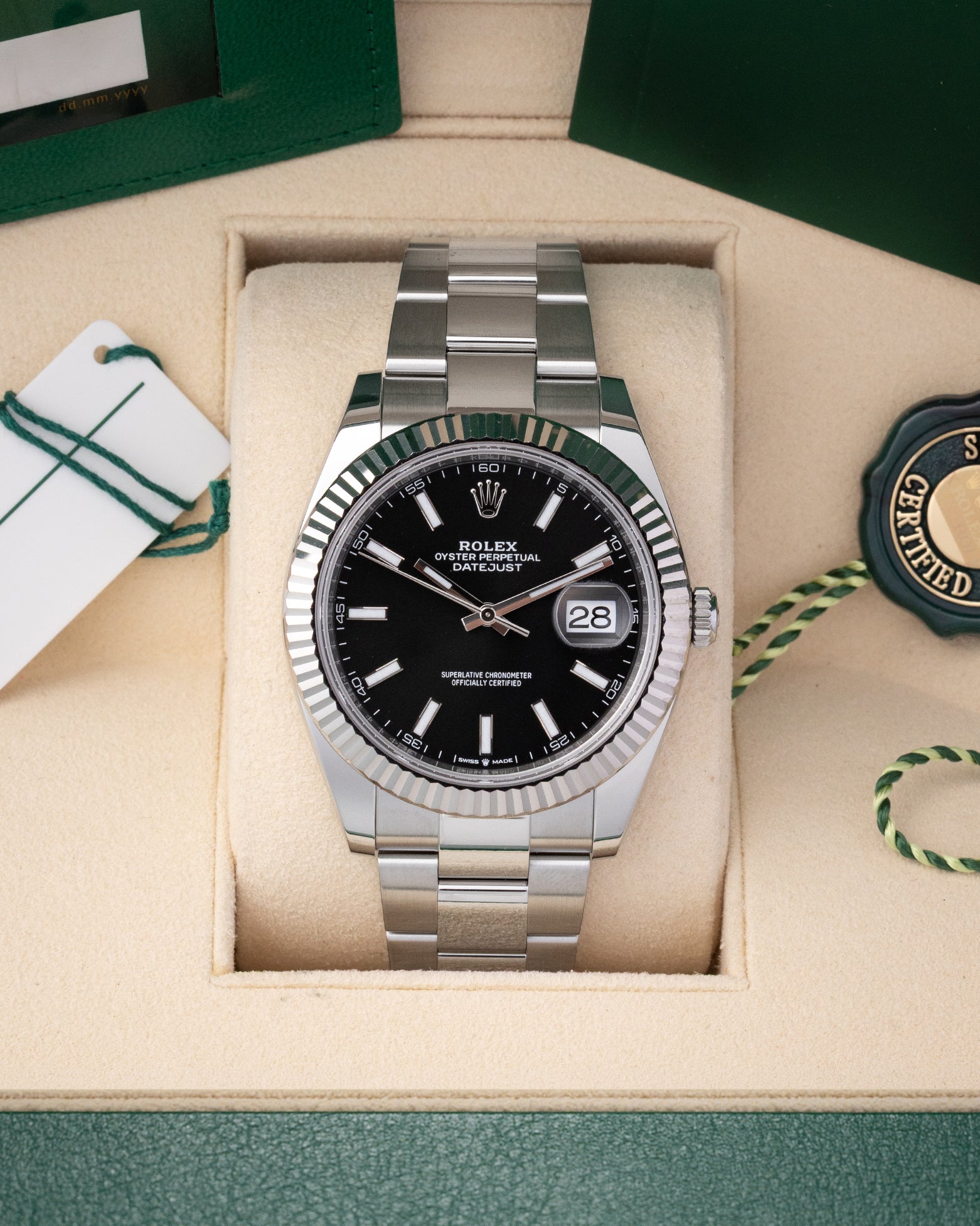 Pre owned 2024 Rolex Datejust 41 126334 black dial with fluted white gold bezel and Oyster bracelet at Noah's Fine Watches Dallas