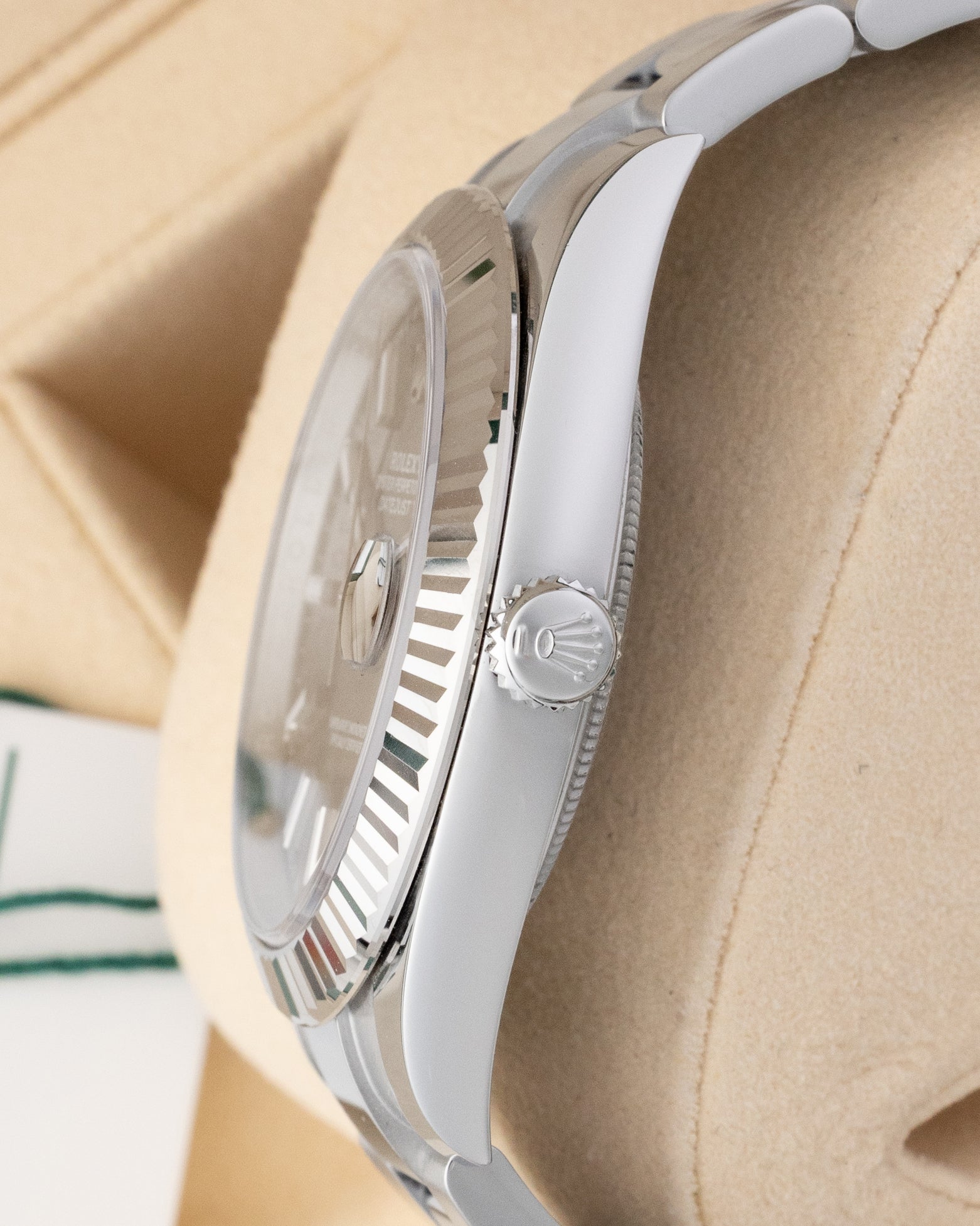 Side profile view of Rolex Datejust 41 126334 showing the Twinlock screw-down winding crown and stainless steel case