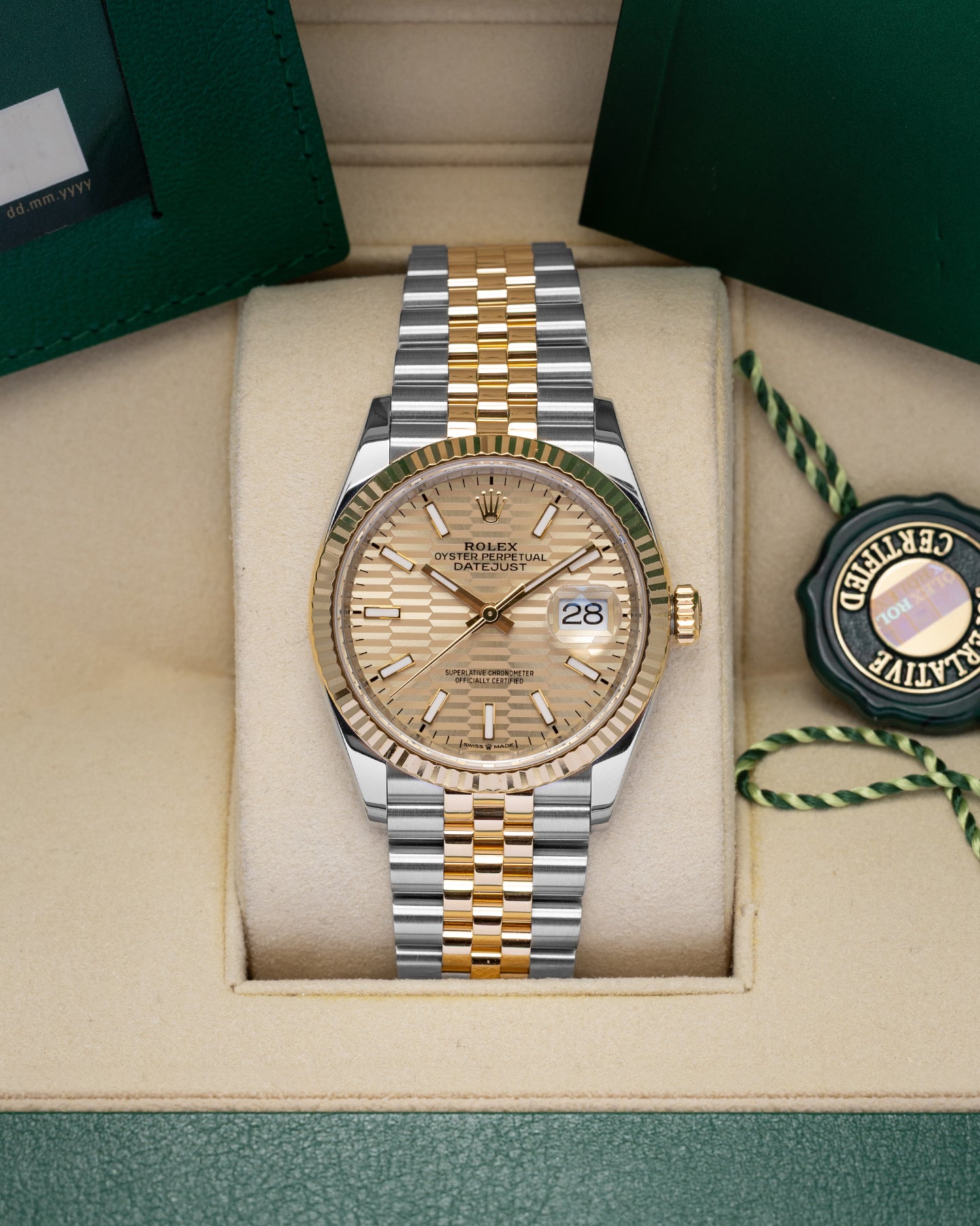 Rolex Datejust Champagne Motif 126233 | Noah's Fine Watches and Jewelry
