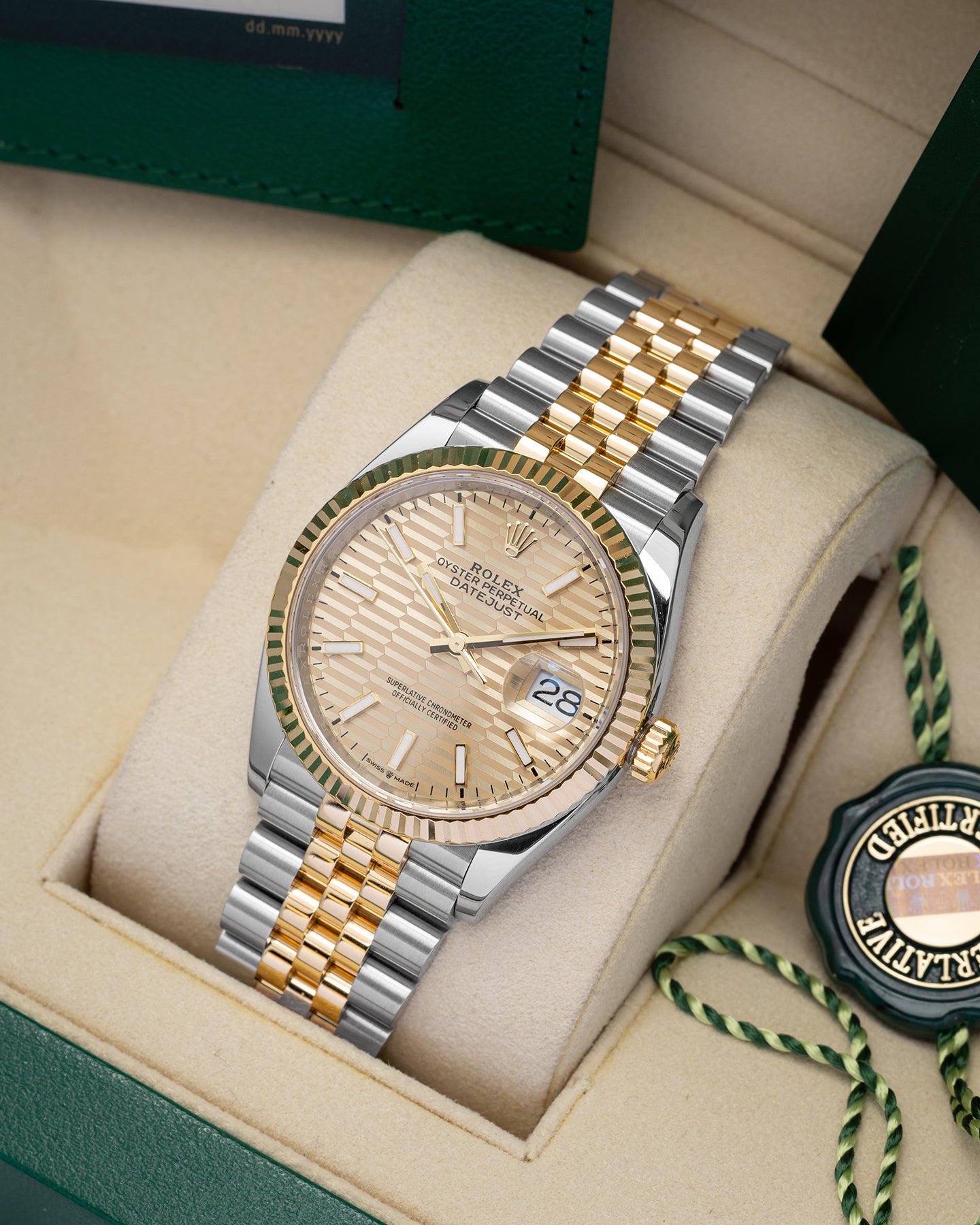 Rolex Datejust Champagne Motif 126233 | Noah's Fine Watches and Jewelry