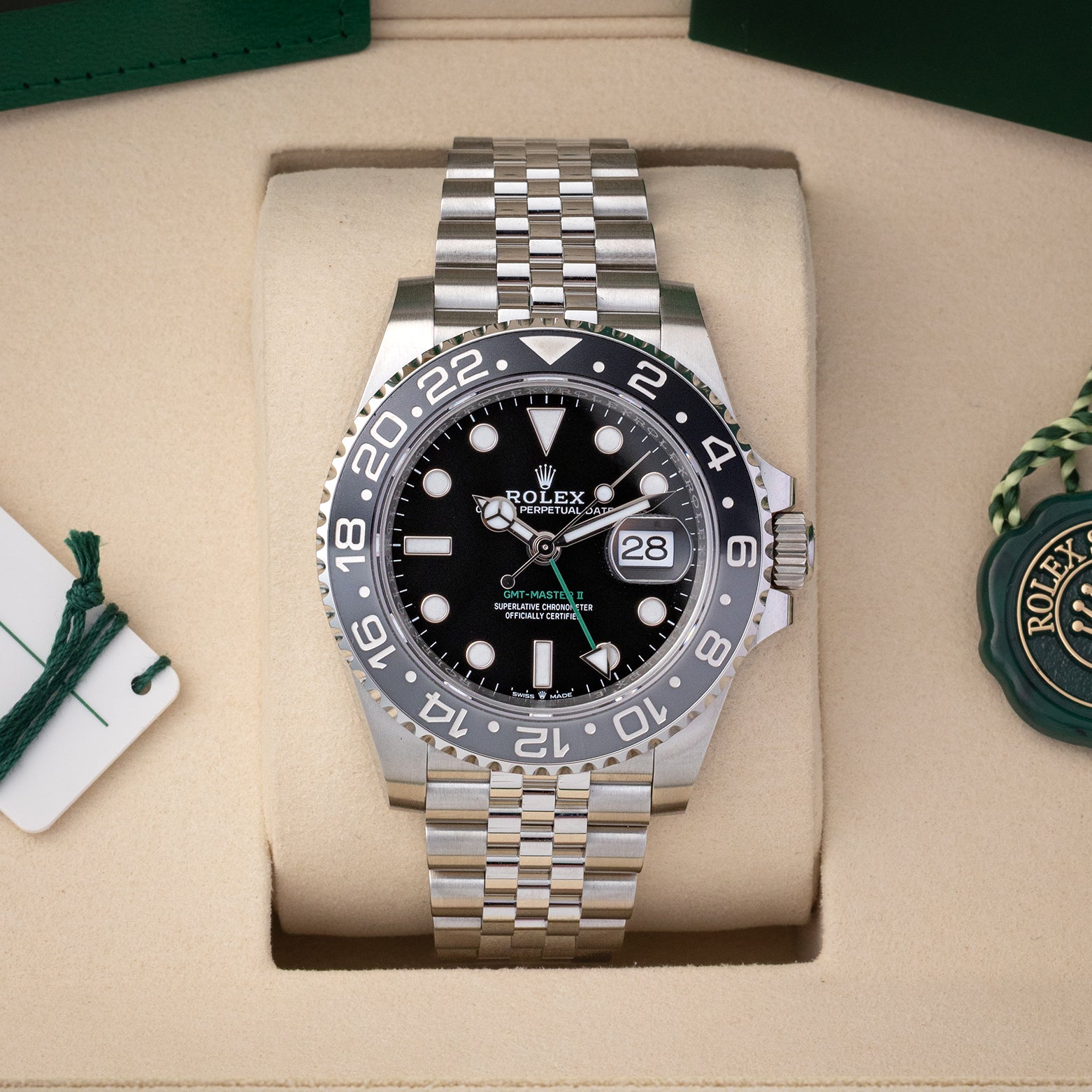 Pre owned 2026 Rolex GMT-Master II 126710GRNR Bruce Wayne grey black bezel on Jubilee bracelet at Noah's Fine Watches Dallas