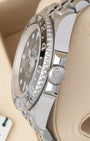 Side profile view of Rolex GMT-Master II 126710GRNR showing Triplock screw-down crown and crown guards