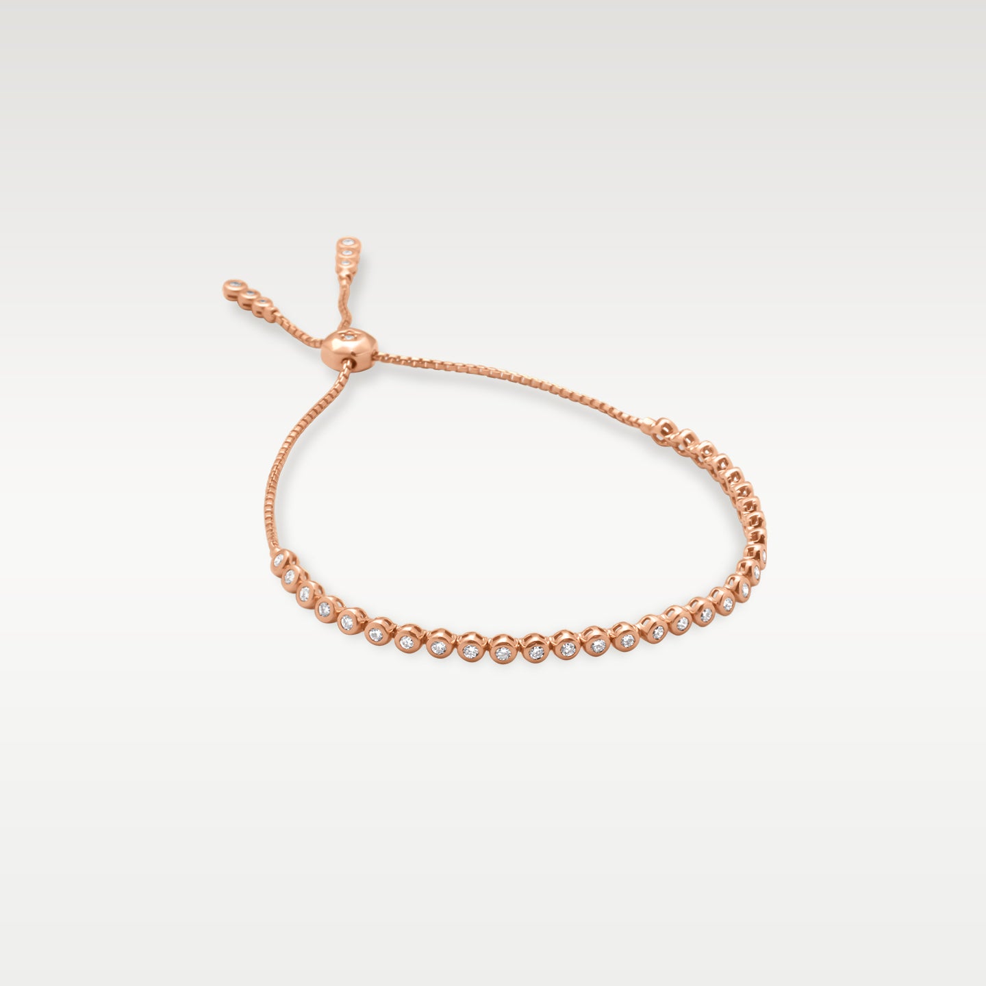 Rose Gold Bezel-Set Diamond Bolo Bracelet | Noah's Fine Jewelry and Watches Dallas