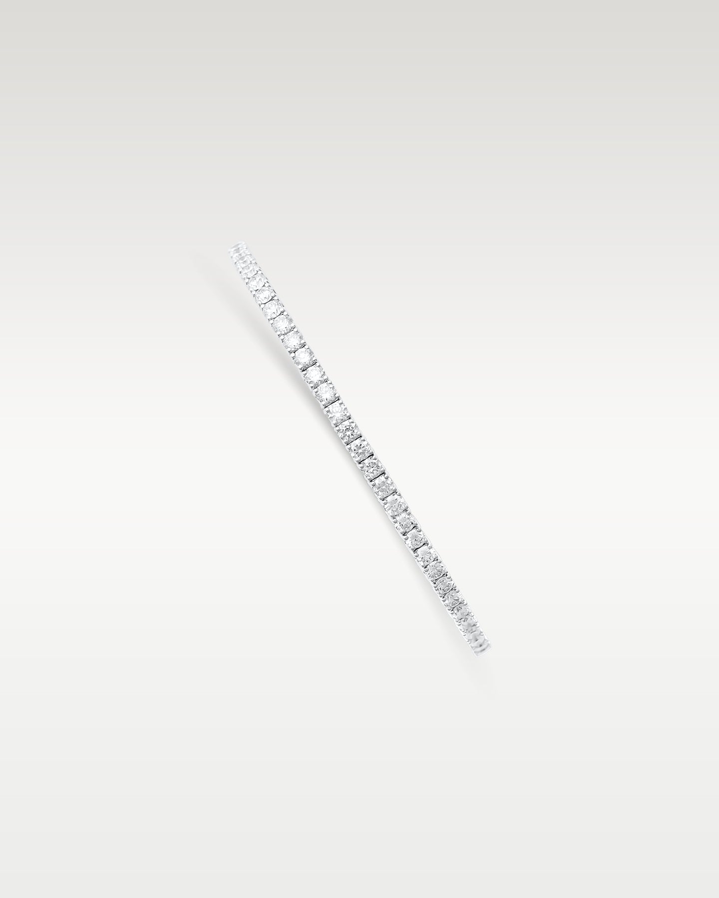 14K Gold Diamond Tennis Flex Bangle | Noah's Fine Watches & Jewelry DFW