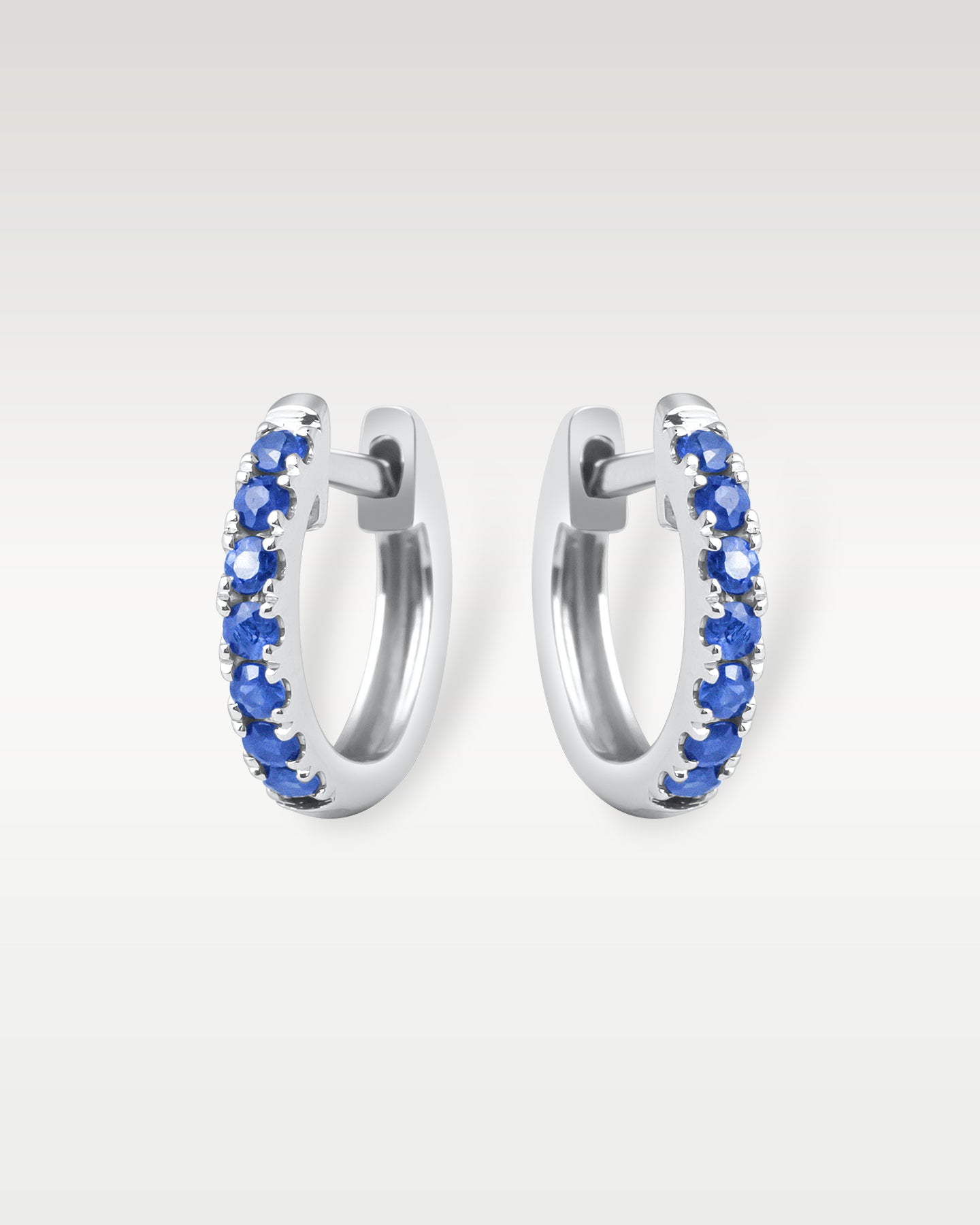 White Gold Sapphire Huggie Hoop Earrings | Noah's Fine Jewelry Dallas