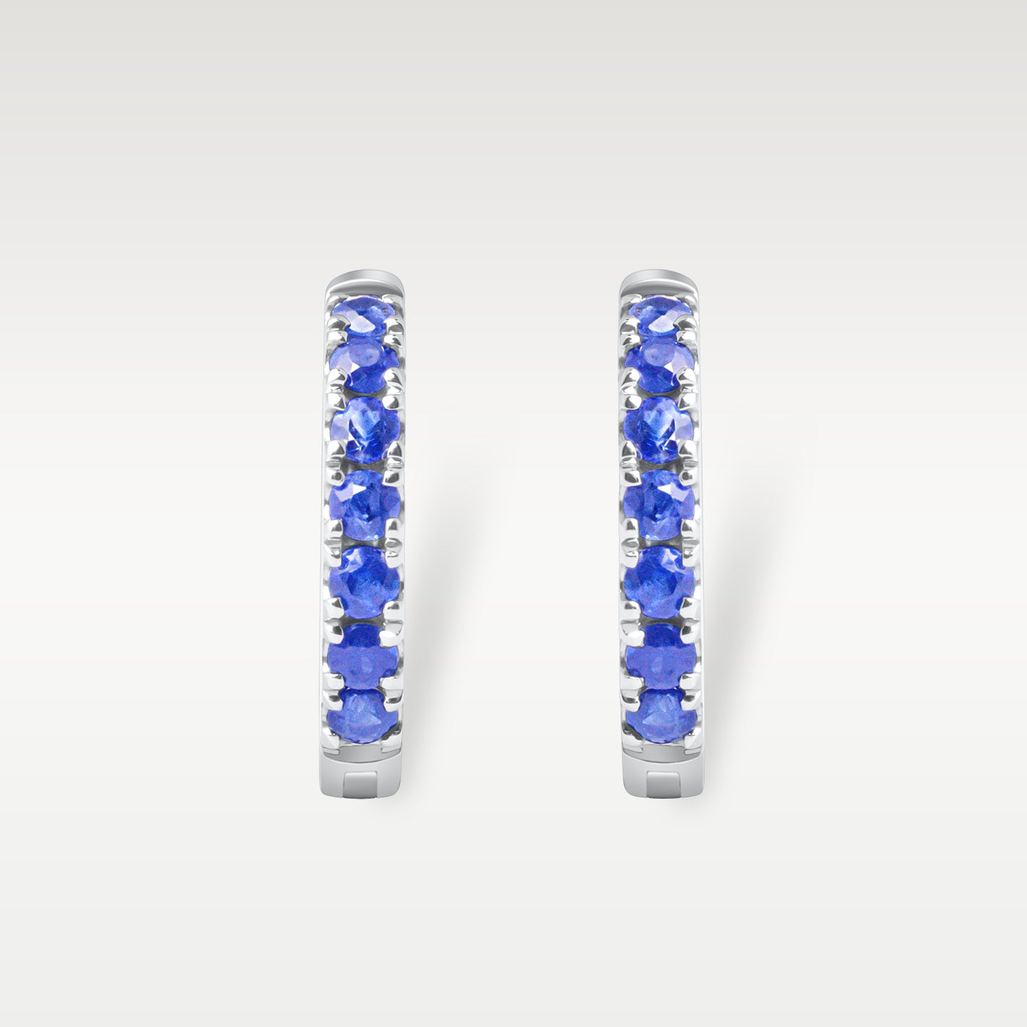 White Gold Sapphire Huggie Hoop Earrings | Noah's Fine Jewelry Dallas