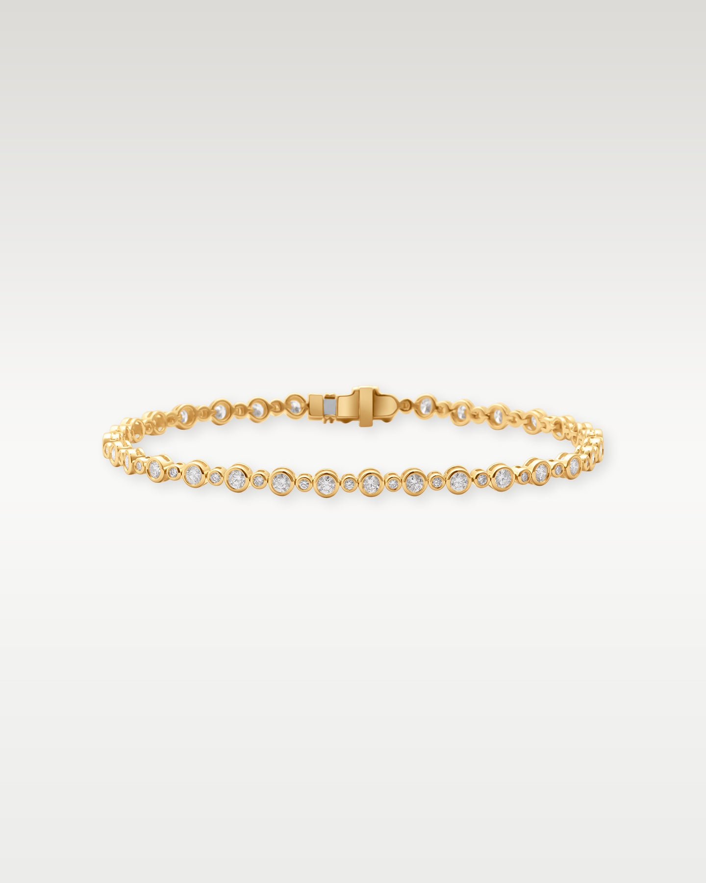 Yellow Gold Bezel Diamond Bracelet | Noah's Fine Jewelry Dallas, Texas