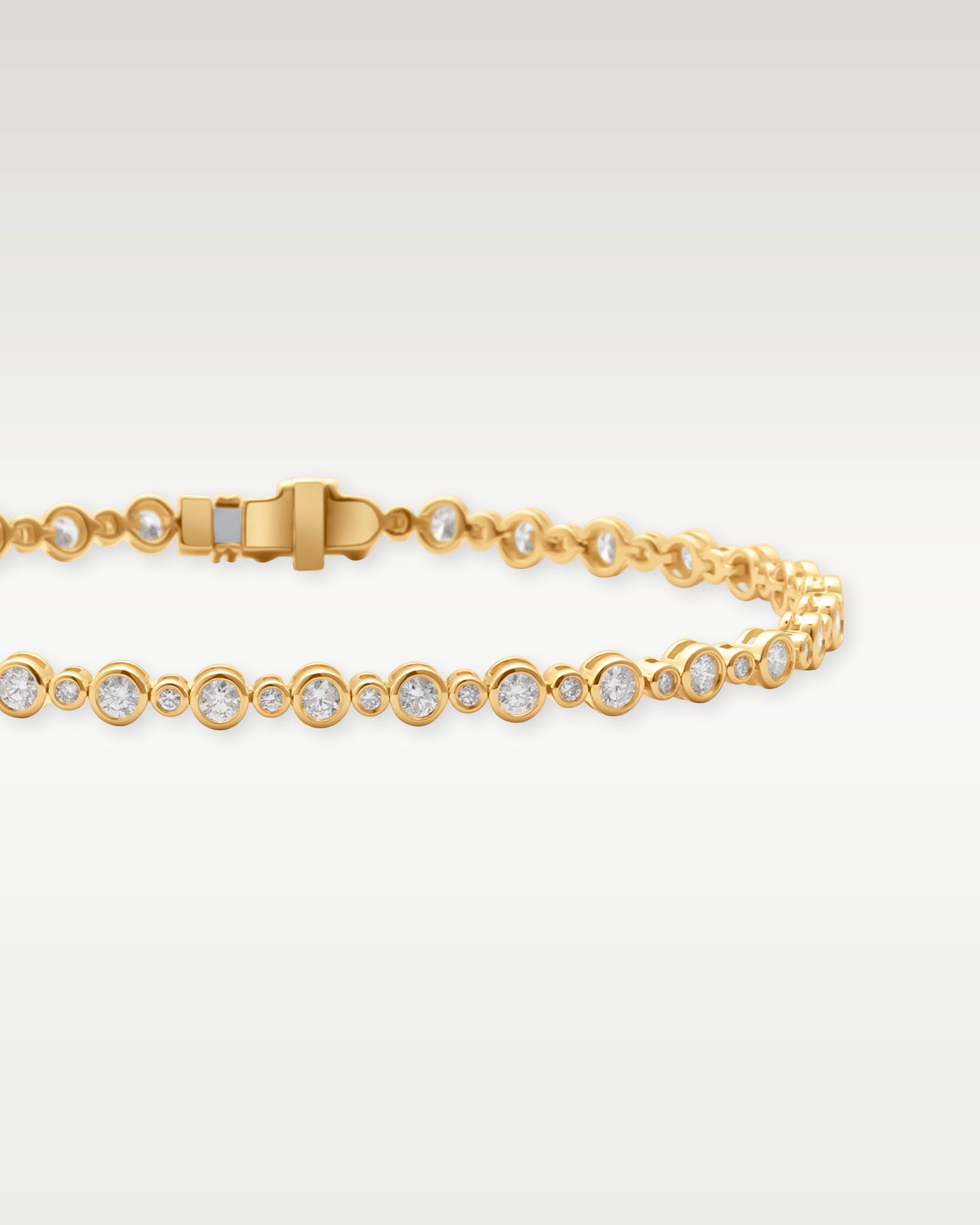 Yellow Gold Bezel Diamond Bracelet | Noah's Fine Jewelry Dallas, Texas