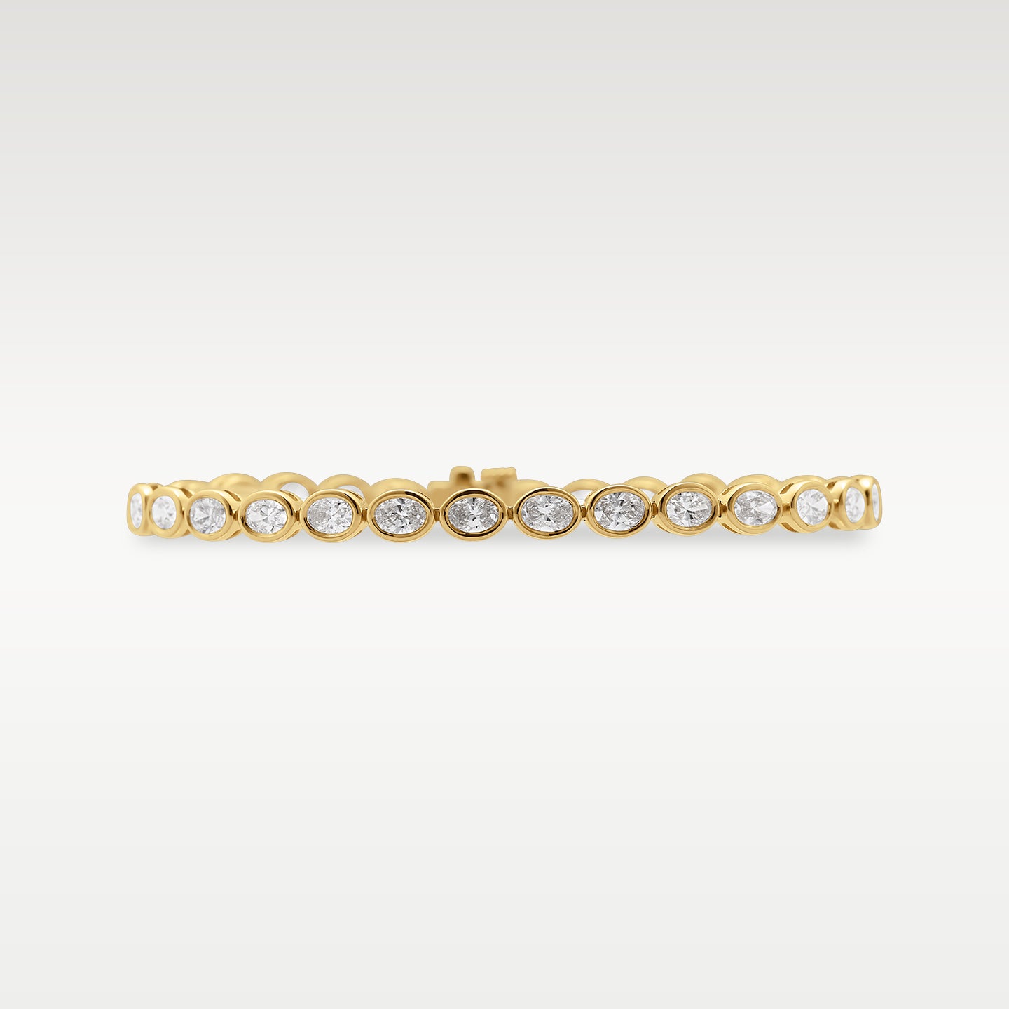 18K Gold Bezel Oval Diamond Tennis Bracelet | Noah's Fine Gold Jewelry TX