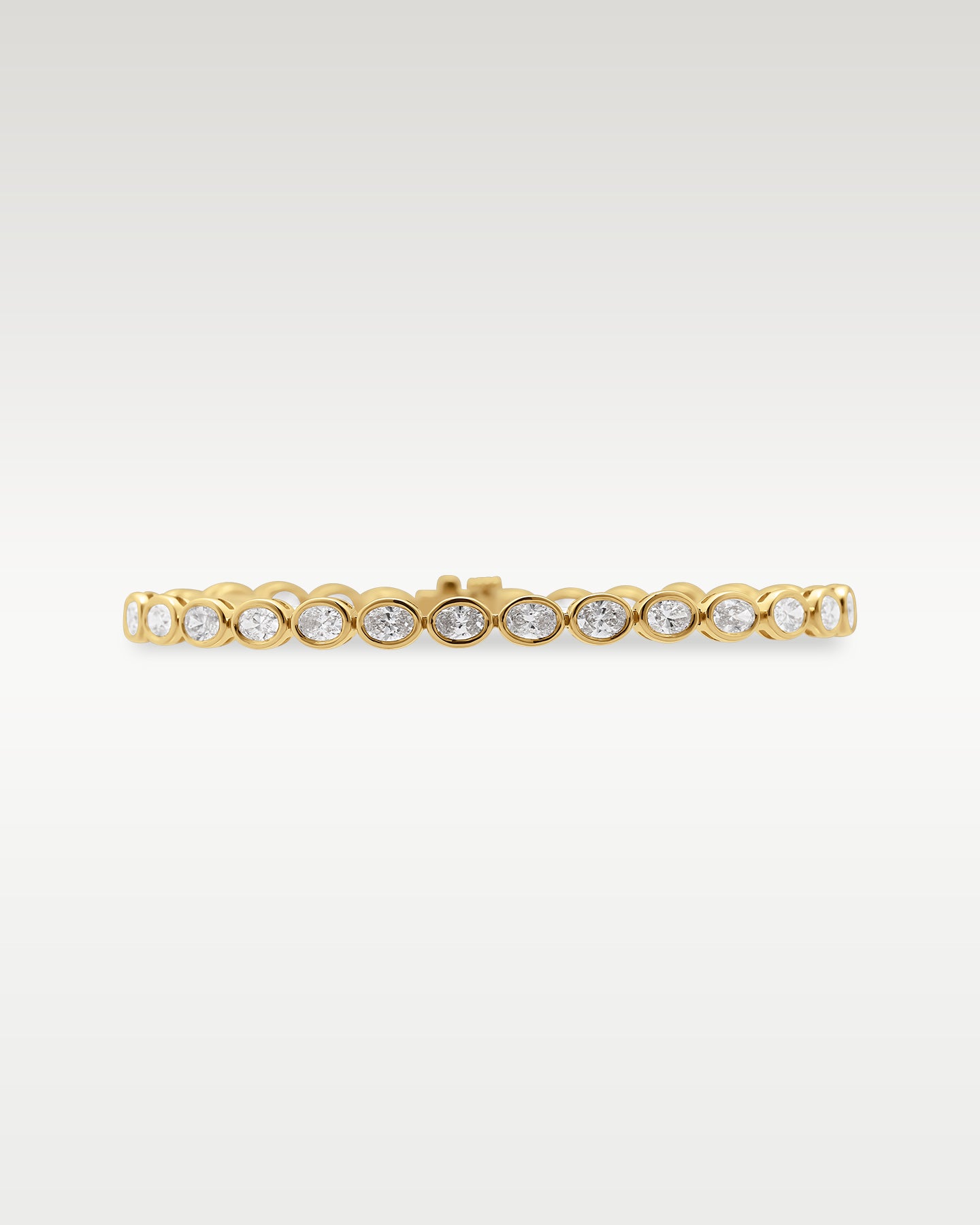 18K Gold Bezel Oval Diamond Tennis Bracelet | Noah's Fine Gold Jewelry TX